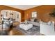 Stylish living room featuring hardwood floors, modern furniture, and an open layout at 948 N Layman Ave, Indianapolis, IN 46219