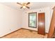 Bedroom with window and ceiling fan fixture at 9608 Sycamore Rd, Carmel, IN 46032