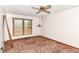 Bedroom with window and ceiling fan fixture at 9608 Sycamore Rd, Carmel, IN 46032