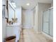 Clean bathroom with modern vanity, well-lit mirror, and walk-in shower at 10197 Apple Blossom Cir, Fishers, IN 46038