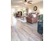 Cozy living room with a beautiful fireplace, comfortable seating, and ample natural light at 10197 Apple Blossom Cir, Fishers, IN 46038