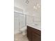 Bathroom with a glass door shower and vanity featuring a dark wood cabinet and a light countertop at 1026 Sorrell Pass, Greenwood, IN 46143