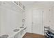 Bright mudroom features custom built-in shelving, seating, and coat hooks for organized entryway storage at 1026 Sorrell Pass, Greenwood, IN 46143
