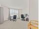 Bright office with neutral decor and large windows offering ample natural light and comfortable work space at 1026 Sorrell Pass, Greenwood, IN 46143