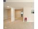 Carpeted basement featuring a decorative support column and an open layout, perfect for recreation at 10555 Serra Vista Pt, Fishers, IN 46040