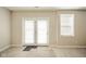 Basement with walkout to yard, featuring natural light and flexible space, perfect for a recreation area at 10555 Serra Vista Pt, Fishers, IN 46040