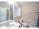 Bathroom with white sink and countertop, a large mirror, and natural light from a window at 10555 Serra Vista Pt, Fishers, IN 46040