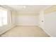 Bright bedroom featuring neutral walls, carpeted floors, and a ceiling fan, providing a comfortable space at 10555 Serra Vista Pt, Fishers, IN 46040