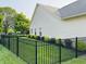 The property has a fenced backyard, new landscaping, manicured grass and a newer roof at 1176 Everton Ct, Greenwood, IN 46143