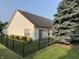 The property has a fenced backyard, new landscaping and a newer roof at 1176 Everton Ct, Greenwood, IN 46143