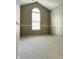 A spacious bedroom features neutral carpet, trim, gray walls and a window with blinds at 1176 Everton Ct, Greenwood, IN 46143