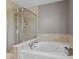 Bathroom showcasing a soaking tub and glass enclosed shower at 1294 Vista Way, Greenwood, IN 46143