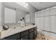 Elegant bathroom with double sinks, updated fixtures, and stylish decor at 1294 Vista Way, Greenwood, IN 46143