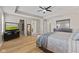 Bedroom featuring neutral walls, light wood floors, and a ceiling fan at 1294 Vista Way, Greenwood, IN 46143