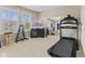 Home exercise room features a treadmill, free weights, and ample natural light at 1294 Vista Way, Greenwood, IN 46143
