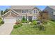 Charming two-story home with landscaped yard and attached two-car garage at 1294 Vista Way, Greenwood, IN 46143