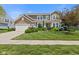 Charming two-story home with landscaped yard and attached two-car garage at 1294 Vista Way, Greenwood, IN 46143
