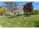 Charming two-story home with landscaped yard and attached two-car garage at 1294 Vista Way, Greenwood, IN 46143