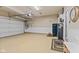 Spacious garage with painted floor and wainscotting at 1294 Vista Way, Greenwood, IN 46143
