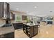 Open-concept kitchen with a center island, seamlessly connecting to the dining and living areas at 1294 Vista Way, Greenwood, IN 46143