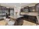 Well-equipped kitchen featuring a center island, granite countertops, and stainless steel appliances at 1294 Vista Way, Greenwood, IN 46143