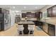 Modern kitchen featuring stainless steel appliances, granite countertops, and a center island at 1294 Vista Way, Greenwood, IN 46143