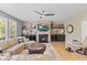 Inviting living room featuring a stone fireplace, mounted television, and comfortable seating at 1294 Vista Way, Greenwood, IN 46143
