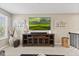 Inviting living room features a modern TV setup, stylish console, and tasteful decorative elements at 1294 Vista Way, Greenwood, IN 46143