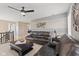 Cozy living area with plush leather seating, a distinctive coffee table, and elegant decor at 1294 Vista Way, Greenwood, IN 46143