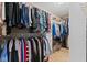 Walk-in closet with ample hanging space and built-in shelving at 1294 Vista Way, Greenwood, IN 46143