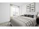 Cozy bedroom with neutral tones, natural light, and city views, offering a serene retreat at 1315 Colere Pl, Indianapolis, IN 46203