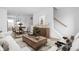 Bright living room with modern furnishings and an open layout, perfect for entertaining and relaxation at 1315 Colere Pl, Indianapolis, IN 46203