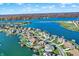 Picturesque aerial of lakefront properties boasting private docks and stunning water views in a desirable community at 13613 Lake Ridge Ln, McCordsville, IN 46055