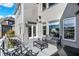 View of the large back deck with seating and open views of the backyard at 13613 Lake Ridge Ln, McCordsville, IN 46055