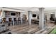 Spacious basement bar area with seating, ideal for entertaining guests at 13613 Lake Ridge Ln, McCordsville, IN 46055