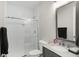 Bathroom featuring glass enclosed shower and marble vanity at 13613 Lake Ridge Ln, McCordsville, IN 46055