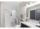 Modern bathroom featuring a glass-enclosed shower and stylish vanity at 13613 Lake Ridge Ln, McCordsville, IN 46055