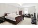 Bright bedroom with ample space, neutral tones, and natural light at 13613 Lake Ridge Ln, McCordsville, IN 46055