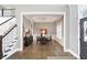 Elegant dining room with hardwood floors and stylish decor, perfect for Gathering gatherings at 13613 Lake Ridge Ln, McCordsville, IN 46055