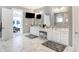 This main bathroom features a double vanity and a water closet at 13613 Lake Ridge Ln, McCordsville, IN 46055