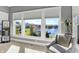 Bright main bedroom boasts waterfront views from large windows at 13613 Lake Ridge Ln, McCordsville, IN 46055