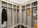 Custom mudroom features cubbies and storage, perfect for organization at 13613 Lake Ridge Ln, McCordsville, IN 46055