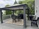 Cozy back deck featuring a gazebo and outdoor dining set, perfect for entertaining at 1378 Runningbrook Dr, Avon, IN 46123