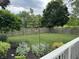 A spacious fenced backyard with lush greenery and well-maintained landscaping at 1378 Runningbrook Dr, Avon, IN 46123