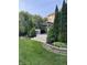 Beautifully landscaped backyard with spacious deck and pergola, perfect for outdoor entertaining at 1378 Runningbrook Dr, Avon, IN 46123