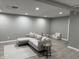 Spacious basement features recessed lighting, modern furniture, and vinyl flooring at 1378 Runningbrook Dr, Avon, IN 46123
