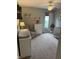 Spacious Bedroom with plush carpet, a cozy rocking chair, and a white dresser with books on the shelves at 1378 Runningbrook Dr, Avon, IN 46123