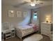 Bedroom featuring neutral walls, carpet, a vanity, and pink accents at 1378 Runningbrook Dr, Avon, IN 46123