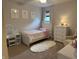 Charming bedroom with bright decor, white furniture, and cozy furnishings at 1378 Runningbrook Dr, Avon, IN 46123