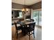 Dining area adjacent to the living room, featuring a table and chairs at 1378 Runningbrook Dr, Avon, IN 46123